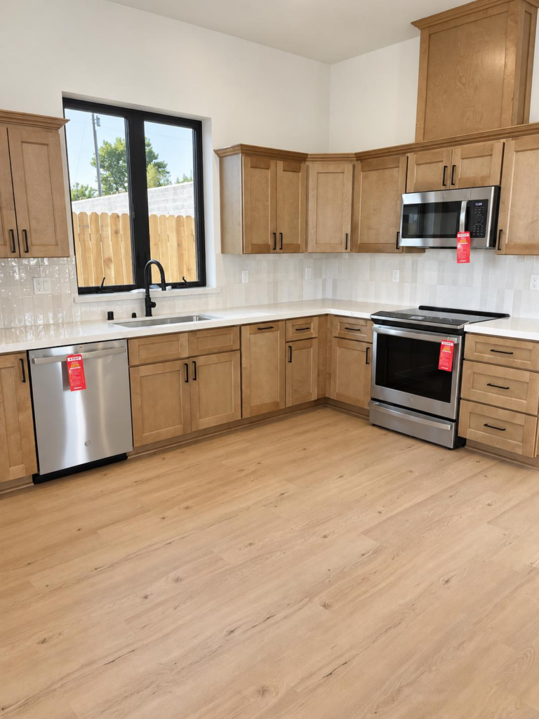 ADU kitchen with shaker cabinetry, quartz counters and stainless appliances at Brady Estates, Roseville CA